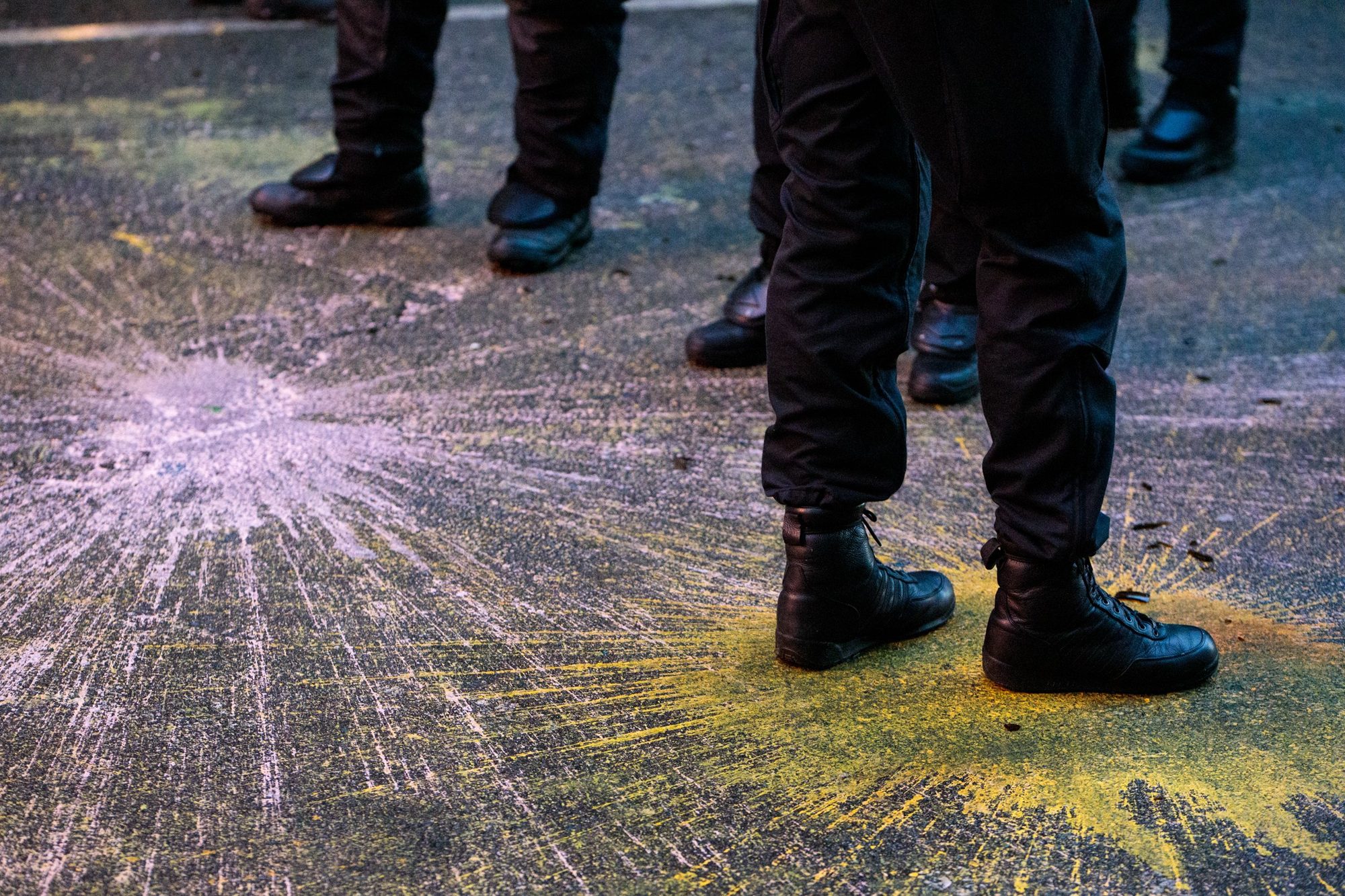 Police stand in paint splatter outside Liebig34, Berlin, 2020