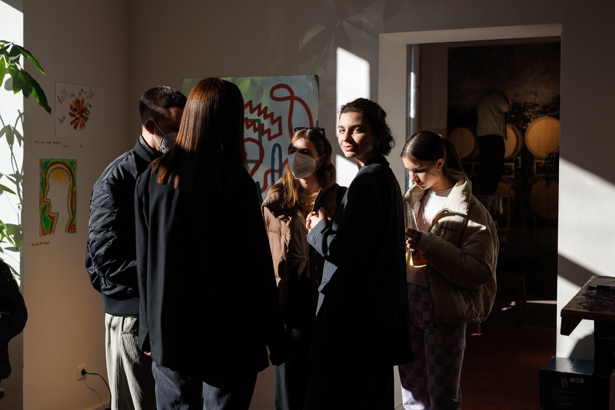 The Petryšyn sisters at an art sale raising funds for the Ukrainian army, Berlin, 2022